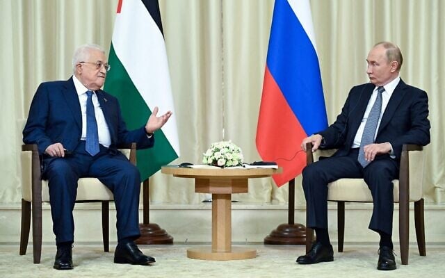 In this pool photograph distributed by Russian state owned Sputnik agency Russia's President Vladimir Putin (R) meets Palestinian Authority President Mahmud Abbas in Novo-Ogaryovo, outside Moscow on August 13, 2024. (Alexey MAISHEV / POOL / AFP)