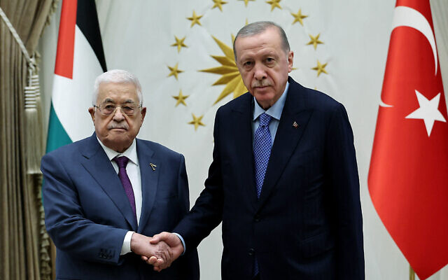 This handout photograph taken and released by the Turkish Presidential Press Service on August 14, 2024, shows Turkish President Recep Tayyip Erdogan (R) shaking hands with Palestinian Authority President Mahmoud Abbas (L) during an official ceremony at the Presidential Complex in Ankara. (Turkish Presidential Press Service/AFP) This handout photograph taken and released by the Turkish Presidential Press Service on August 14, 2024, shows Turkish President Recep Tayyip Erdogan (R) shaking hands with Palestinian Authority President Mahmoud Abbas (L) during an official ceremony at the Presidential Complex in Ankara. (Turkish Presidential Press Service/AFP)
