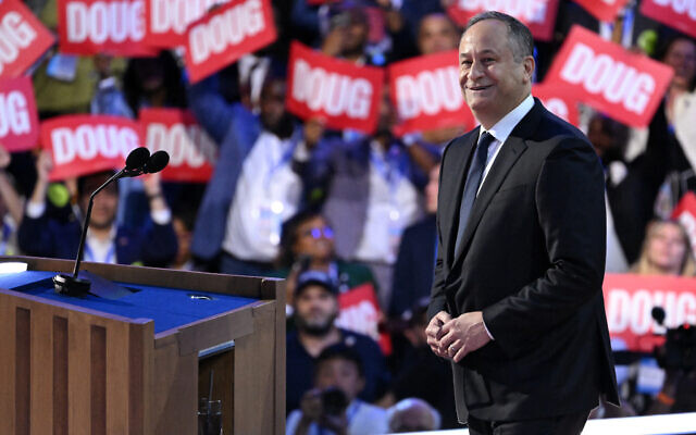 US Second Gentleman Douglas Emhoff approaches the podium to speak on the second day of the Democratic National Convention at the United Center in Chicago, on August 20, 2024. (Saul Loeb/AFP)