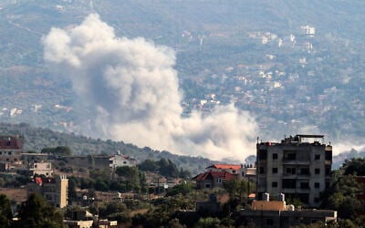 Smoke billows from the site of an Israeli strike that targeted a Hezbollah site in the southern Lebanese village of Kfar Kila on August 21, 2024. (Rabih Daher/ AFP)