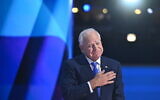 Minnesota Governor and 2024 Democratic vice presidential candidate Tim Walz gestures after speaking on the third day of the Democratic National Convention (DNC) at the United Center in Chicago, Illinois, on August 21, 2024. (SAUL LOEB / AFP)