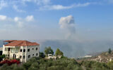 Smoke billows from an area targeted by an Israeli airstrike in the southern Lebanese village of Qusayr on August 25, 2024. (AFP)