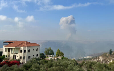 Smoke billows from an area targeted by an Israeli airstrike in the southern Lebanese village of Qusayr on August 25, 2024. (AFP)