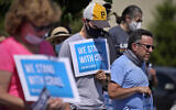 The Jewish Federation of Pittsburgh holds a peace vigil in support of Israel at the Jewish Federation in Pittsburgh, May 21, 2021. (AP Photo/Gene J. Puskar)