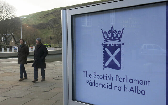 People walk past the Scottish Parliament in Edinburgh, on March 16, 2014. (AP Photo/Jill Lawless, File) People walk past the Scottish Parliament in Edinburgh, on March 16, 2014. (AP Photo/Jill Lawless, File)