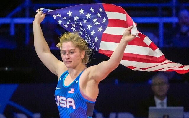Amit Elor celebrates defeating Davaanasan Enkh Amar of Mongolia and winning the women's freestyle 72 kg wrestling final match during the Wrestling World Championships in Belgrade, Serbia, September 21, 2023. (AP Photo/Darko Vojinovic)