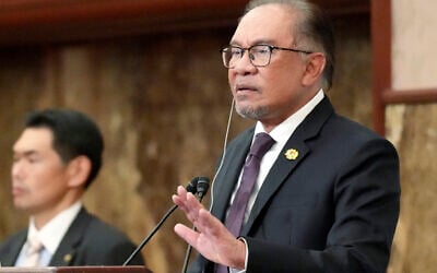 Malaysian Prime Minister Anwar Ibrahim delivers his speech during a press conference at Japan National Press Club in Tokyo Friday, May 24, 2024. (AP Photo/Eugene Hoshiko)
