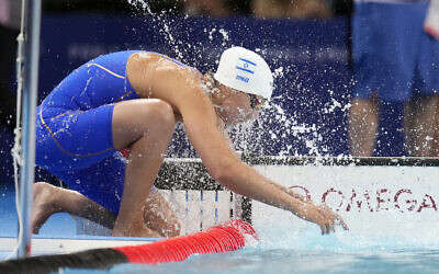 Israeli swimmer Andrea Murez prepares for her leg of the 4x100-meter mixed medley relay at the Paris 2024 Summer Olympics in Nanterre, France, August 2, 2024. (AP Photo/Natacha Pisarenko)