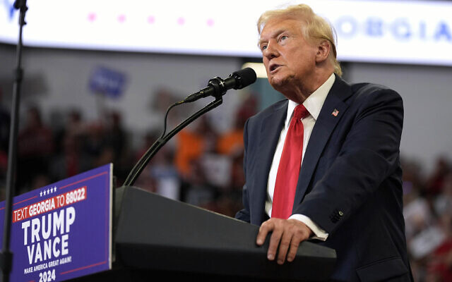 Republican presidential candidate former us president Donald Trump speaks at a campaign rally at Georgia State University in Atlanta, August 3, 2024. (AP Photo/John Bazemore) Republican presidential candidate former us president Donald Trump speaks at a campaign rally at Georgia State University in Atlanta, August 3, 2024. (AP Photo/John Bazemore)