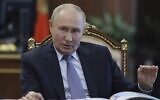Russian President Vladimir Putin gestures during a meeting at the Kremlin in Moscow, Russia, August 6, 2024. (Gavriil Grigirov, Sputnik, Kremlin Pool Photo via AP)