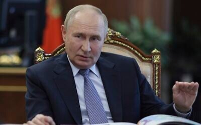 Russian President Vladimir Putin gestures during a meeting at the Kremlin in Moscow, Russia, August 6, 2024. (Gavriil Grigirov, Sputnik, Kremlin Pool Photo via AP)