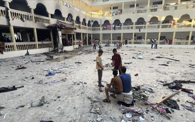 This image made from a video, shows the yard of a school after being hit by an Israeli airstrike in Gaza City, August 10, 2024. Israel said it hit a Hamas and Islamic Jihad command center in the school. (AP Photo)