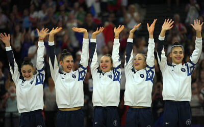 Team Israel greets fans after winning the silver medal in the group all-around rhythmic gymnastics at La Chapelle Arena during the 2024 Summer Olympics, Aug. 10, 2024, in Paris, France. (AP Photo/Dar Yasin)