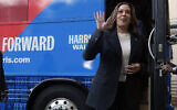 Illustrative: Democratic presidential nominee and US Vice President Kamala Harris waves as she exits her campaign bus in Savannah, Georgia, August 28, 2024. (AP Photo/Jacquelyn Martin)
