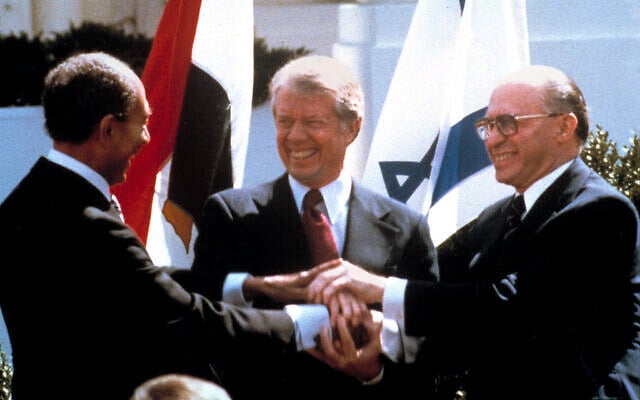 Egyptian President Anwar Sadat, left, US President Jimmy Carter, center, and late Prime Minister Menachem Begin clasp hands on the North Lawn of the White House as they completed signing of the peace treaty between Egypt and Israel in Washington, March 26, 1979. (AP Photo/Bob Daugherty) Egyptian President Anwar Sadat, left, US President Jimmy Carter, center, and late Prime Minister Menachem Begin clasp hands on the North Lawn of the White House as they completed signing of the peace treaty between Egypt and Israel in Washington, March 26, 1979. (AP Photo/Bob Daugherty)