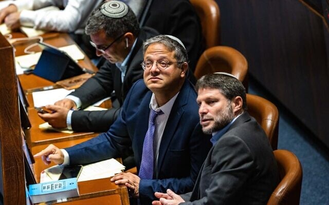 Religious Zionism party party chief Bezalel Smotrich (right) and Otzma Yehudit party chief Itamar Ben Gvir are seen during a vote at the Knesset in Jerusalem, on December 28, 2022. (Olivier Fitoussi/Flash90) Religious Zionism party party chief Bezalel Smotrich (right) and Otzma Yehudit party chief Itamar Ben Gvir are seen during a vote at the Knesset in Jerusalem, on December 28, 2022. (Olivier Fitoussi/Flash90)