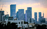 View of the sun setting in Tel Aviv, January 29, 2024 (Moshe Shai/FLASH90)
