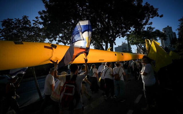 Marking 300 days since Israel's hostages were taken into captivity on October 7 by Hamas terrorists, hundreds of people march from Jerusalem's First Station Complex to the Great Synagogue, August 1, 2024. (Jamal Awad/Flash90) Marking 300 days since Israel's hostages were taken into captivity on October 7 by Hamas terrorists, hundreds of people march from Jerusalem's First Station Complex to the Great Synagogue, August 1, 2024. (Jamal Awad/Flash90)
