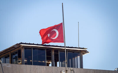 The Turkish flag is flown at half-mast in honor of slain Hamas leader Ismail Haniyeh at the Turkish Embassy in Tel Aviv on August 2, 2024. (Avshalom Sassoni/Flash90)