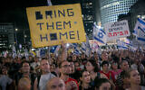 Protesters outside the Kirya military headquarters in Tel Aviv demand early elections and a deal for the release of the hostages held by Hamas in Gaza, August 10, 2024. (Miriam Alster/Flash90)