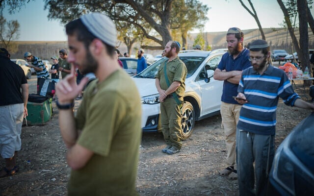Illustrative: Right-wing Jews advocating for resettlement of Gaza gather near the border with the Strip, on the eve of Tisha B'Av, August 12, 2024. (Erik Marmor/Flash90) Illustrative: Right-wing Jews advocating for resettlement of Gaza gather near the border with the Strip, on the eve of Tisha B'Av, August 12, 2024. (Erik Marmor/Flash90)