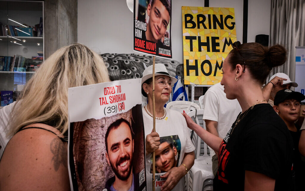 Relatives of Israelis held hostage by Hamas terrorists in Gaza meet with members of the Israeli Olympic team in Tel Aviv on August 14, 2024. (Avshalom Sassoni/Flash90)