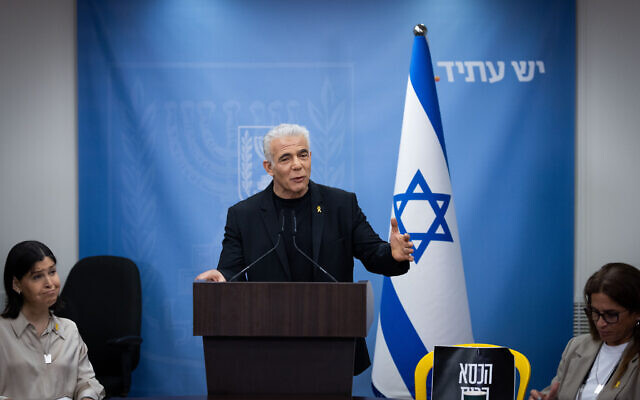 Opposition Leader Yair Lapid addresses his Yesh Atid party's weekly faction meeting in the Knesset, August 14, 2024. (Chaim Goldberg/Flash90) Opposition Leader Yair Lapid addresses his Yesh Atid party's weekly faction meeting in the Knesset, August 14, 2024. (Chaim Goldberg/Flash90)