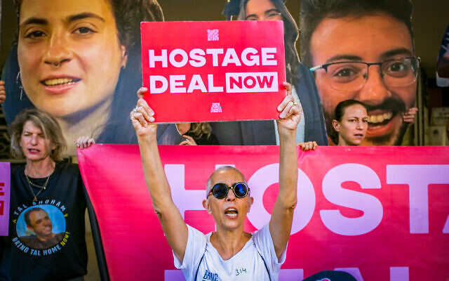 Illustrative: Relatives of Israelis held hostage by Hamas terrorists in Gaza protest for their release, outside the Likud headquarters in Tel Aviv, August 15, 2024. (Flash90) Illustrative: Relatives of Israelis held hostage by Hamas terrorists in Gaza protest for their release, outside the Likud headquarters in Tel Aviv, August 15, 2024. (Flash90)