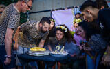 Family members of Israeli hostage Romi Gonen celebrate her 24th birthday, in Tel Aviv, August 18, 2024. (Avshalom Sassoni/Flash90)