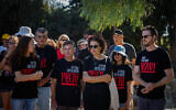 Family and friends attend the funeral service of Yagev Buchshtab at the Cemetery in Kibbutz Nirim, on August 21, 2024, Yagev Buchshtab was kidnapped to the Gaza Strip on October 7, 2023, his body was recently brought back to Israel in an Israeli military operation. (Chaim Goldberg/Flash90)