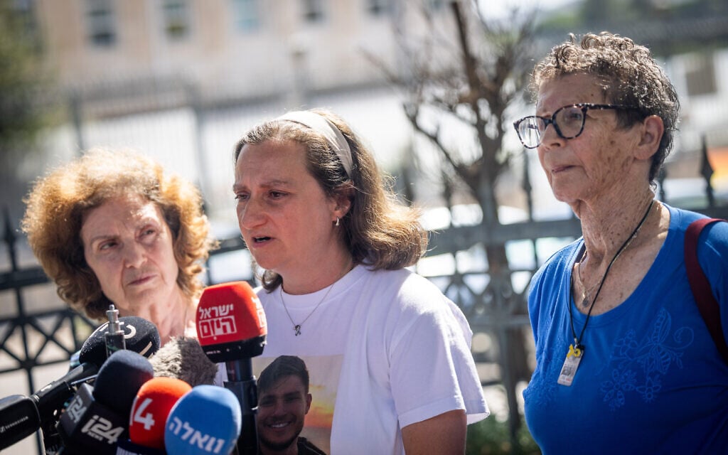 Released hostages Yocheved Lifshitz, Yelena Trufanova, and her mother Irena Tati, who were kidnapped by Hamas terrorists on October 7, speak to the media after meeting with Prime Minister Benjamin Netanyahu, outside the Prime Minister's office in Jerusalem, August 23, 2024. (Yonatan Sindel/Flash90)