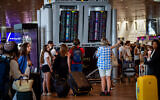 Passengers at the Ben Gurion International airport near Tel Aviv on August 25, 2024. (Avshalom Sassoni/Flash90)