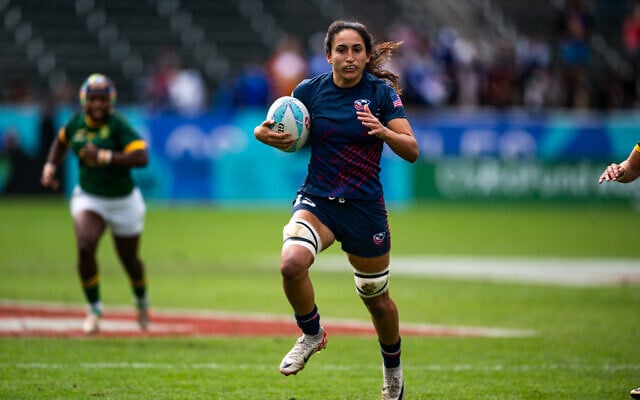 Sarah Levy of the US national women's rugby team carries the ball at the Paris Olympics, August 2024. (Evan Denworth)