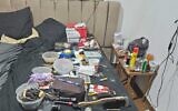 Evidence found by police in a search of a Tel Aviv Central Bus Station-area apartment of a sexual abuse suspect identified by Hebrew media as Abraham Perlmutter, released August 1, 2024. (Israel Police)