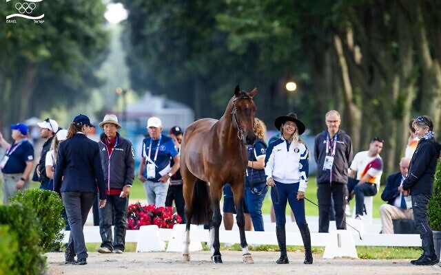 Israeli equestrian Ashlee Bond with her horse Donatello in a pre-competition Olympic event at the 2024 Paris Olympics on July 31, 2024. (Lily Forado/Israel Equestrian Federation) Israeli equestrian Ashlee Bond with her horse Donatello in a pre-competition Olympic event at the 2024 Paris Olympics on July 31, 2024. (Lily Forado/Israel Equestrian Federation)