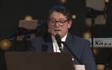Cantor Nikola David appears in a 2018 performance. (March of Life on YouTube via JTA)