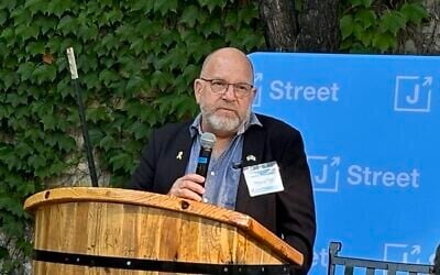Jonathan Dekel-Chen, the father of American-Israeli hostage Sagui Dekel-Chen, speaks at a J Street event on the sidelines of the Democratic National Convention in Chicago, August 21, 2024. (Jacob Magid/The Times of Israel)