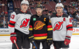 From left to right: Luke, Quinn and Jack Hughes pose for a photo before their NHL game at Rogers Arena in Vancouver, Canada, December 5, 2023. (Jeff Vinnick/JTA via NHLI via Getty Images)