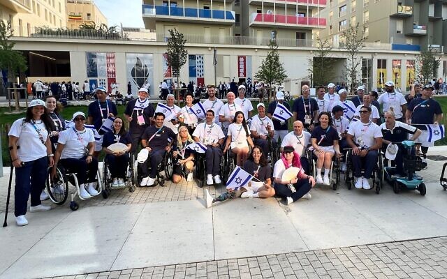 Israel's Paralympic delegation prepares to march in the Games' opening ceremony in Paris, France, on August 28, 2024. (Courtesy Israel Paralympic Committee)