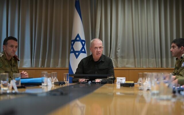 Defense Minister Yoav Gallant (center) holds a meeting in his office, August 29, 2024. (Shahar Keinan/Defense Ministry) Defense Minister Yoav Gallant (center) holds a meeting in his office, August 29, 2024. (Shahar Keinan/Defense Ministry)