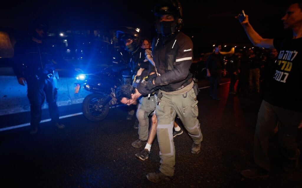 A protester is arrested amid clashes with police in Tel Aviv following a rally for a hostage deal and against the government, August 31, 2024. (Gil Levin/Pro-Democracy Protest Movement)
