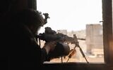 An IDF soldier operating in the Gaza Strip, in an image published on August 7, 2024. (Israel Defense Forces)