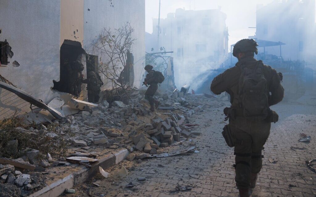 IDF troops seen operating in the Gaza Strip in this handout photo published on August 23, 2024. (Israel Defense Forces)