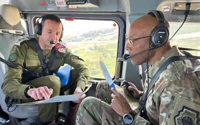 IDF Chief of Staff Lt. Gen. Herzi Halevi (left) and  Chairman of the Joint Chiefs of Staff, Gen. Charles Q. Brown, Jr, fly to the IDF Northern Command, August 26, 2024. (Israel Defense Forces)
