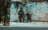 Troops of the Kfir Brigade's Haruv Reconnaissance Unit are seen operating in the West Bank city of Tulkarem, August 28, 2024. (Israel Defense Forces)