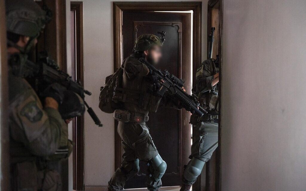IDF troops seen operating in the Gaza Strip in this handout photo published on August 24, 2024. (Israel Defense Forces)