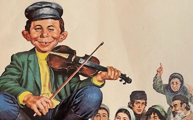 'What, Me Worry? The Art and Humor of MAD Magazine,' an exhibit at the Norman Rockwell Museum, features Norman Mingo's 1973 cover illustration for MAD Magazine #156 depicting Alfred E. Neuman as a character in 'Fiddler on the Roof.' (JTA Photo; MAD and all related elements © & ™ E.C. Publications. Courtesy of DC. All Rights Reserved. Used with permission.)