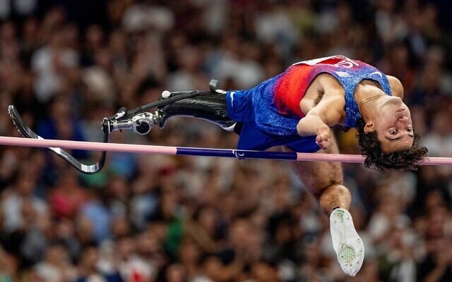 Gold medallist, US' Ezra Frech, competing in the men's high jump T63 event during the Paris 2024 Paralympic Games at Stade de France, in Saint-Denis, France, September 3, 2024 (Photo by Bob MARTIN / OIS/IOC / AFP). Gold medallist, US' Ezra Frech, competing in the men's high jump T63 event during the Paris 2024 Paralympic Games at Stade de France, in Saint-Denis, France, September 3, 2024 (Photo by Bob MARTIN / OIS/IOC / AFP).