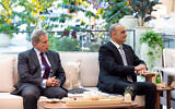 Jafar Hassan, left, appointed Jordan's prime minister on Sunday, sits with his predecessor, then-PM Bisher Khasawneh, at Al Shati Palace, in Abu Dhabi, United Arab Emirates, March 21, 2024. (Ryan Carter/UAE Presidential Court/Handout via REUTERS)