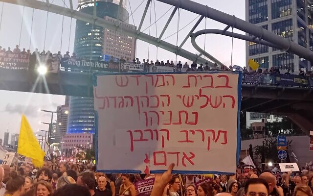Protesters demanding a hostage release deal block traffic on Tel Aviv's Begin Street on September 3, 2024. (Noam Lehmann/Times of Israel)